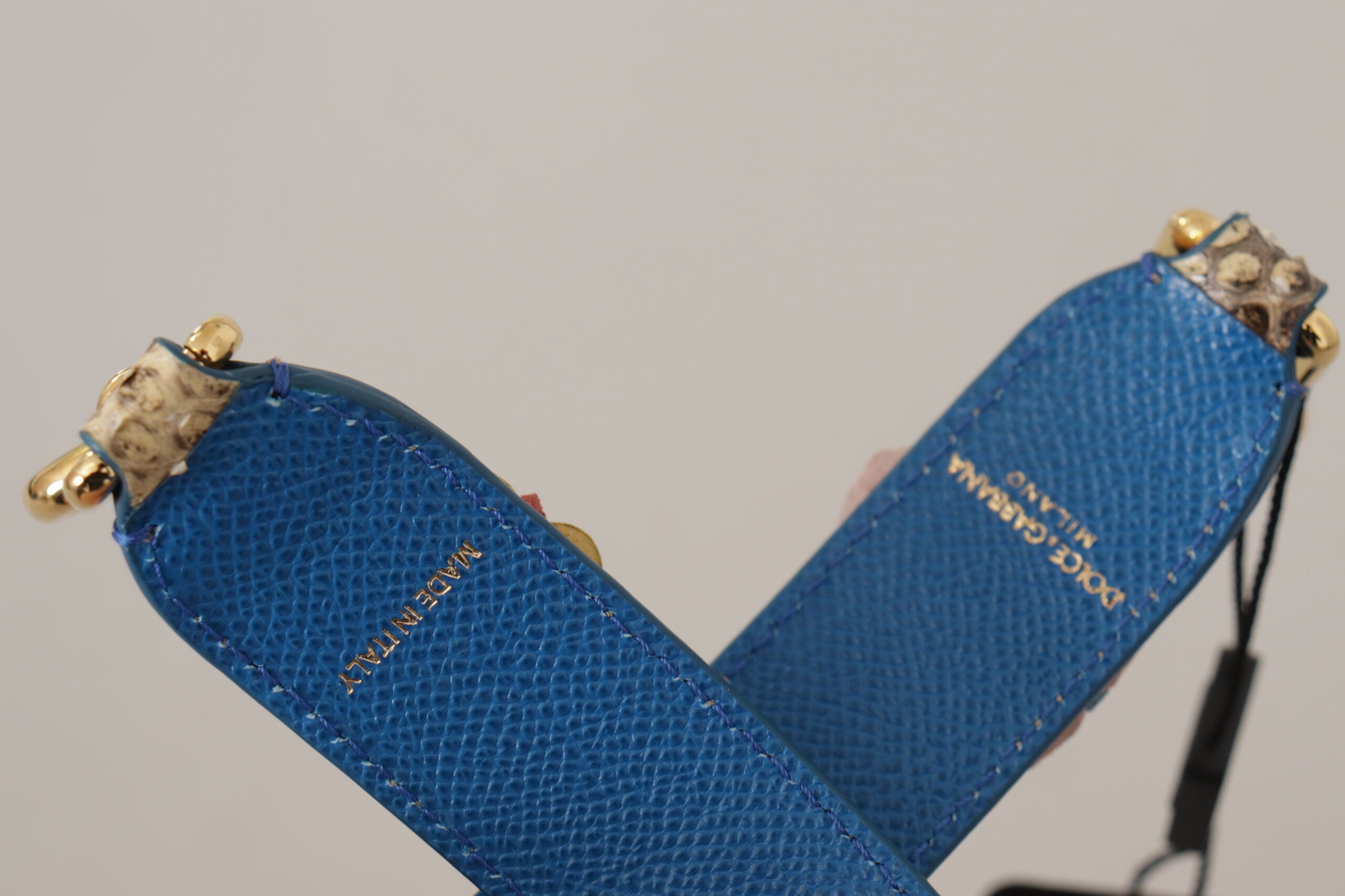 Beigefarbener Pythonleder-Schulterriemen mit floralen Nieten