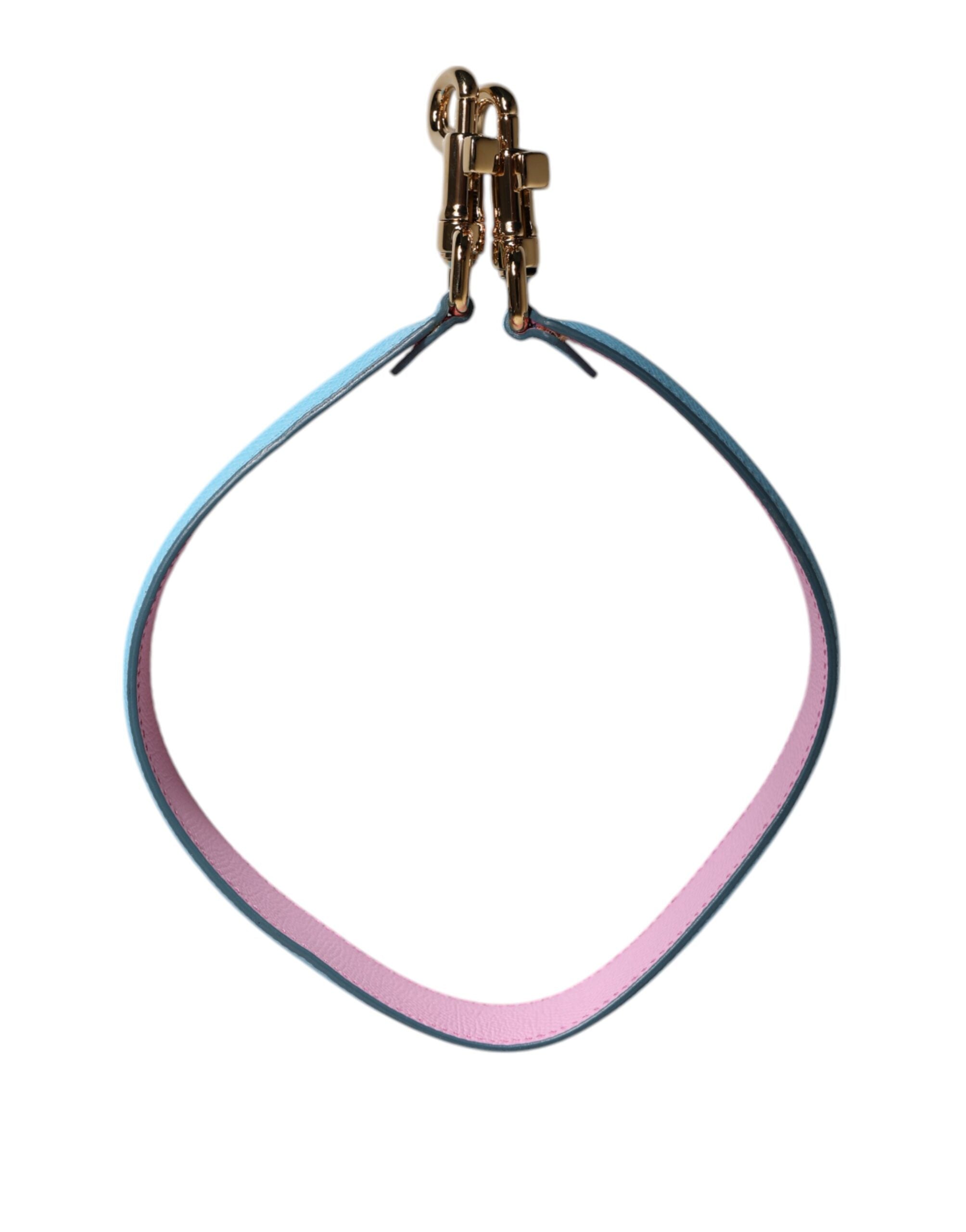 Pinke blaue Ledertasche mit Griff und Schulterriemen